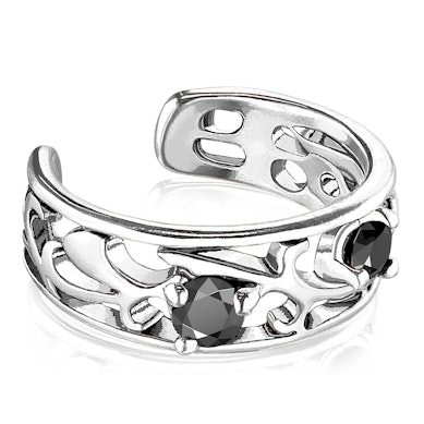 Auss kaffi ar filigrānu dizainu un diviem melniem kristāliem