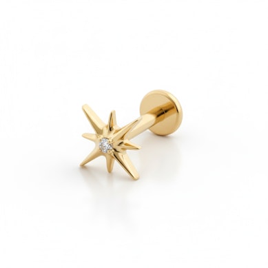 Titāna labrete zvaigznes formā ar centrālo akmentiņu