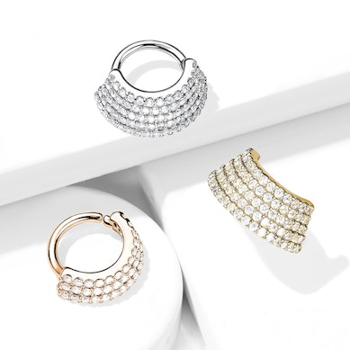 Pīrsingu gredzens ar vairoga formas rotājumu un kristāliem