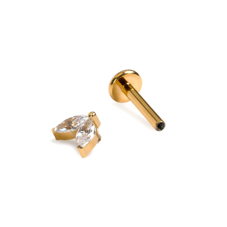 Titāna labrete ar diviem vienādiem akmentiņiem