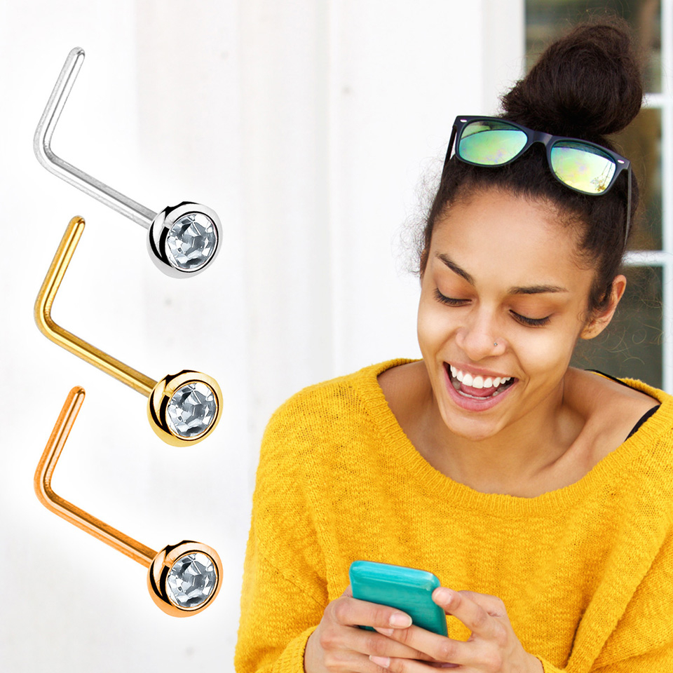 Deguna pīrsings no 14 karātu zelta ar rāmī iestatītu kristālu