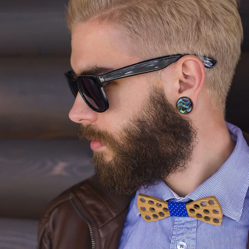 Plugs no koka ar gliemežnīcu