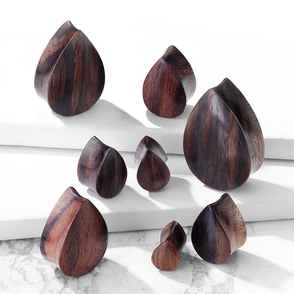 Plugs no koka lāses formā