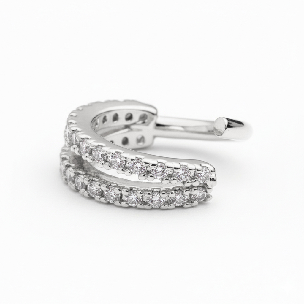 Pīrsingu gredzens ar divām kristāliem noklātām joslām