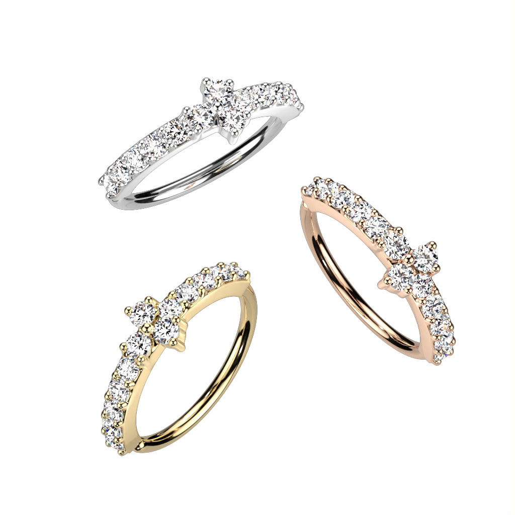 Pīrsingu gredzens ar pavé izkārtotiem kristāliem un centrālu kompozīciju