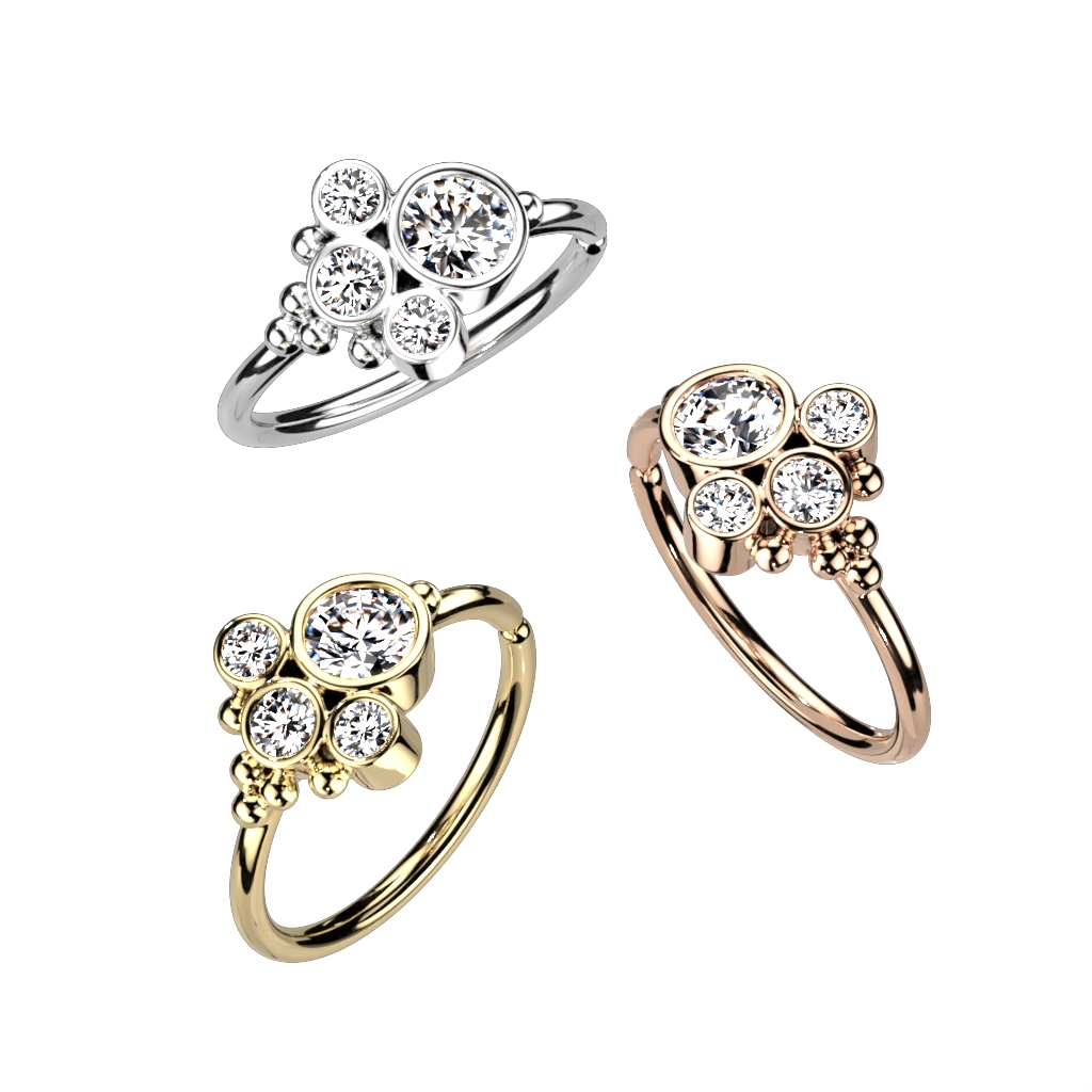 Pīrsingu gredzens ar ievalcētu apļveida kristālu un lodīšu kompozīciju