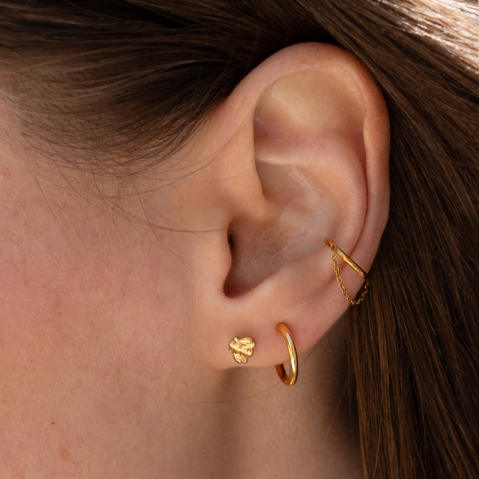 Pīrsingu gredzens ar eņģīti un ķēdīti