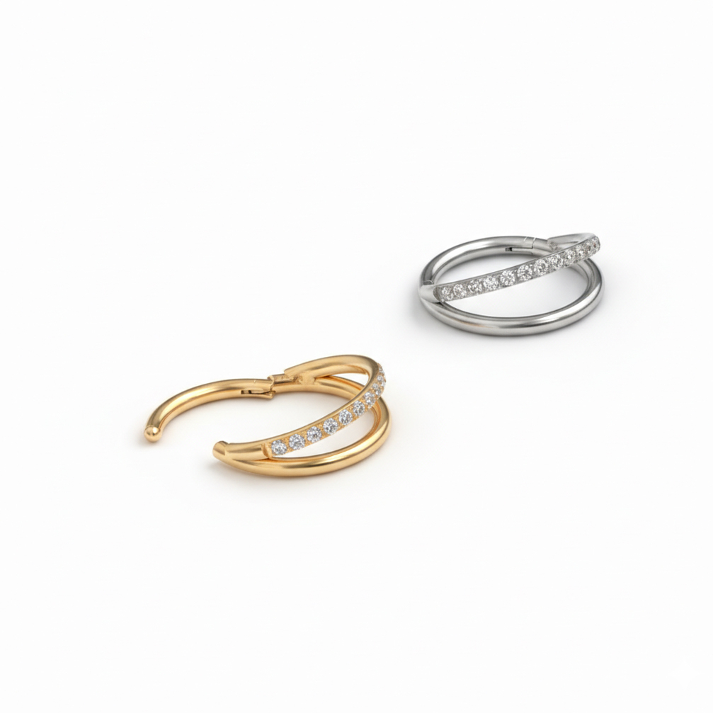 Divkāršs titāna pīrsingu gredzens ar akmentiņiem uz loka