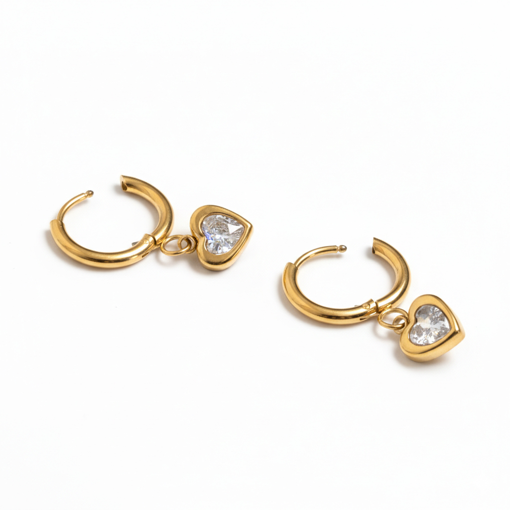 Pīrsingu gredzenu pāris ar sirds piekariņiem