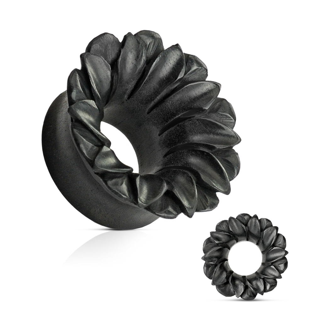 Tunelis no melna koka zieda formā