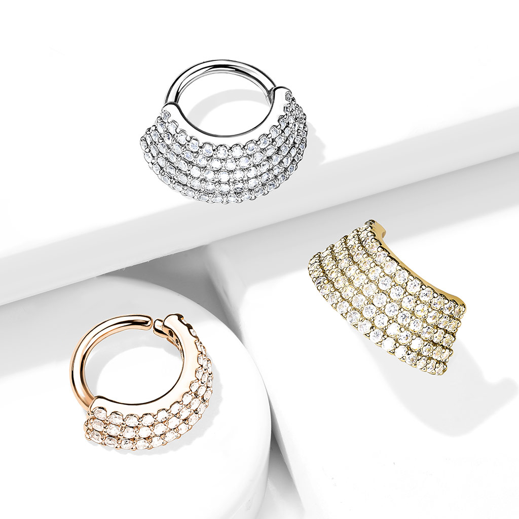 Pīrsingu gredzens ar vairoga formas rotājumu un kristāliem